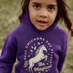 a little girl wearing purple Fleece Hoodie