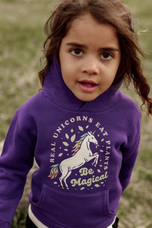 a little girl wearing purple Fleece Hoodie